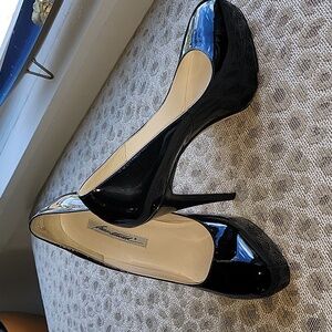 Black patent leather pumps